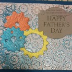 Gear embossing folder with CTMH cricut Artist cartridge. Stampin Up papers and Viva metallic rub.
